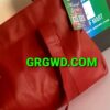 Red shoulder bag is available at CART of MART by G